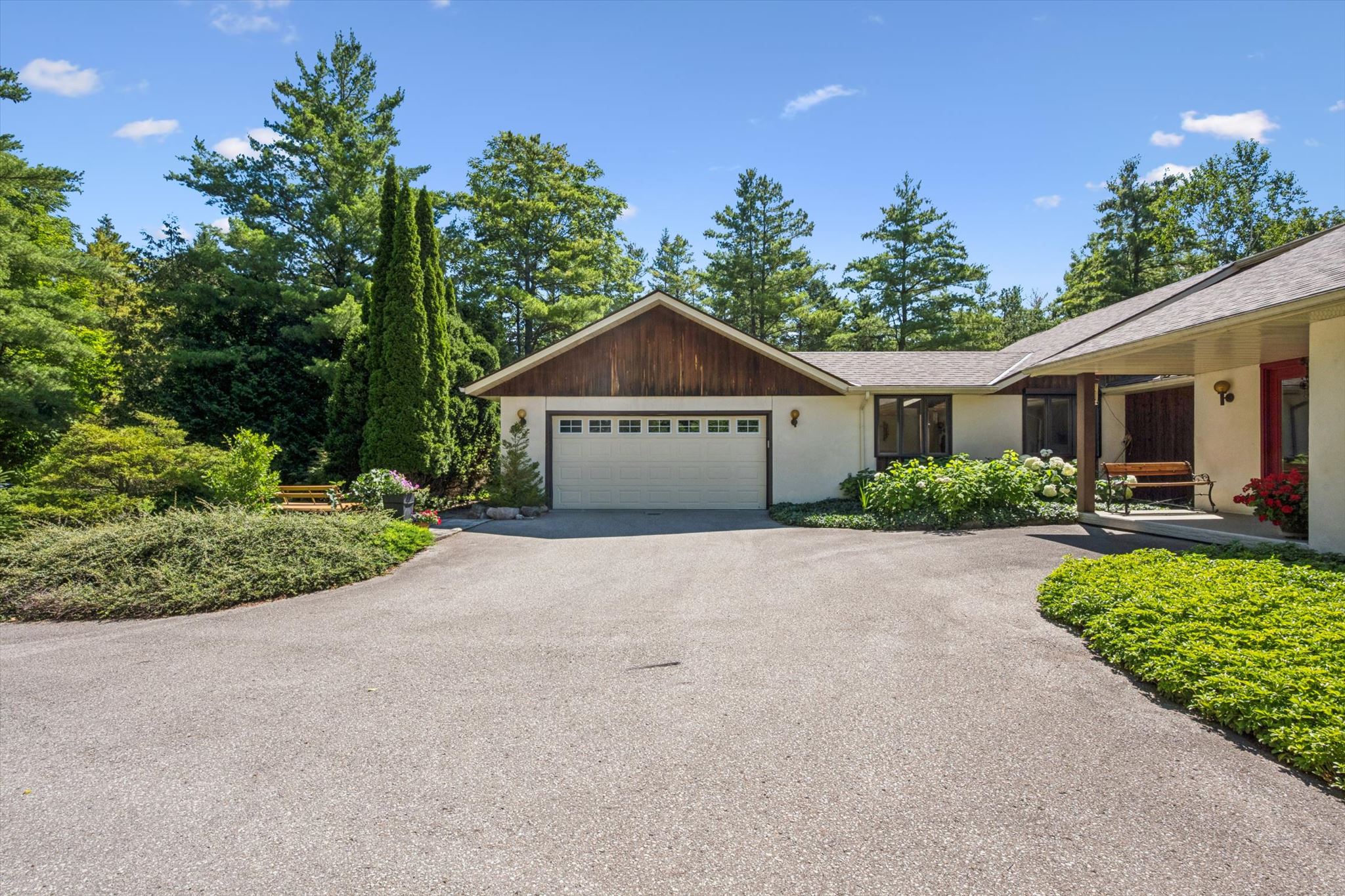Attached double garage and the turning court