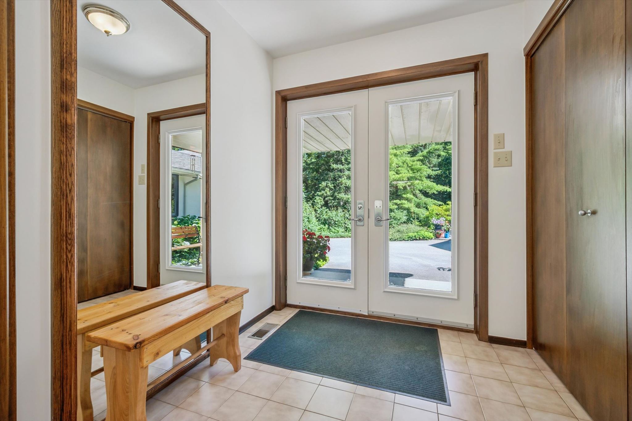 Tiled foyer with garden doors to the courtyard