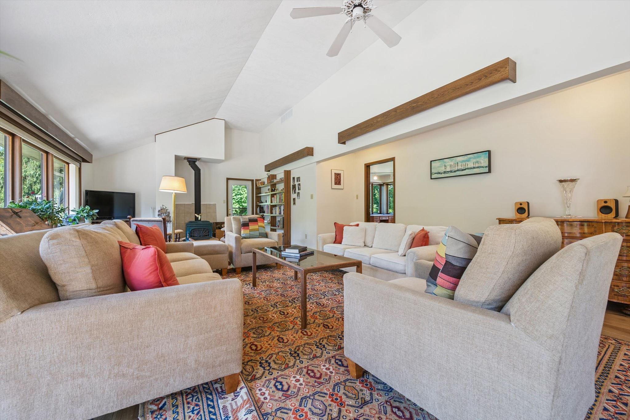 Living room toward the wood stove and library wall
