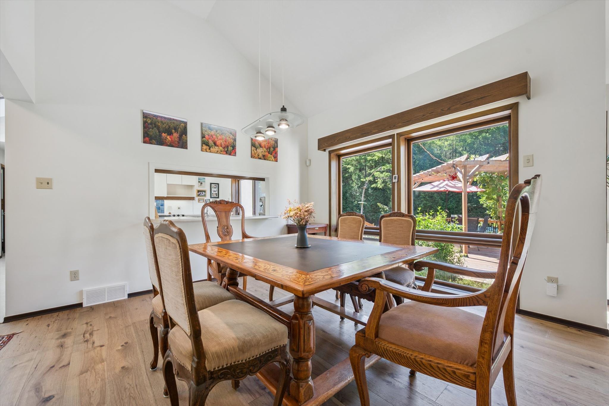 Dining room, with the deck and pergola beyond