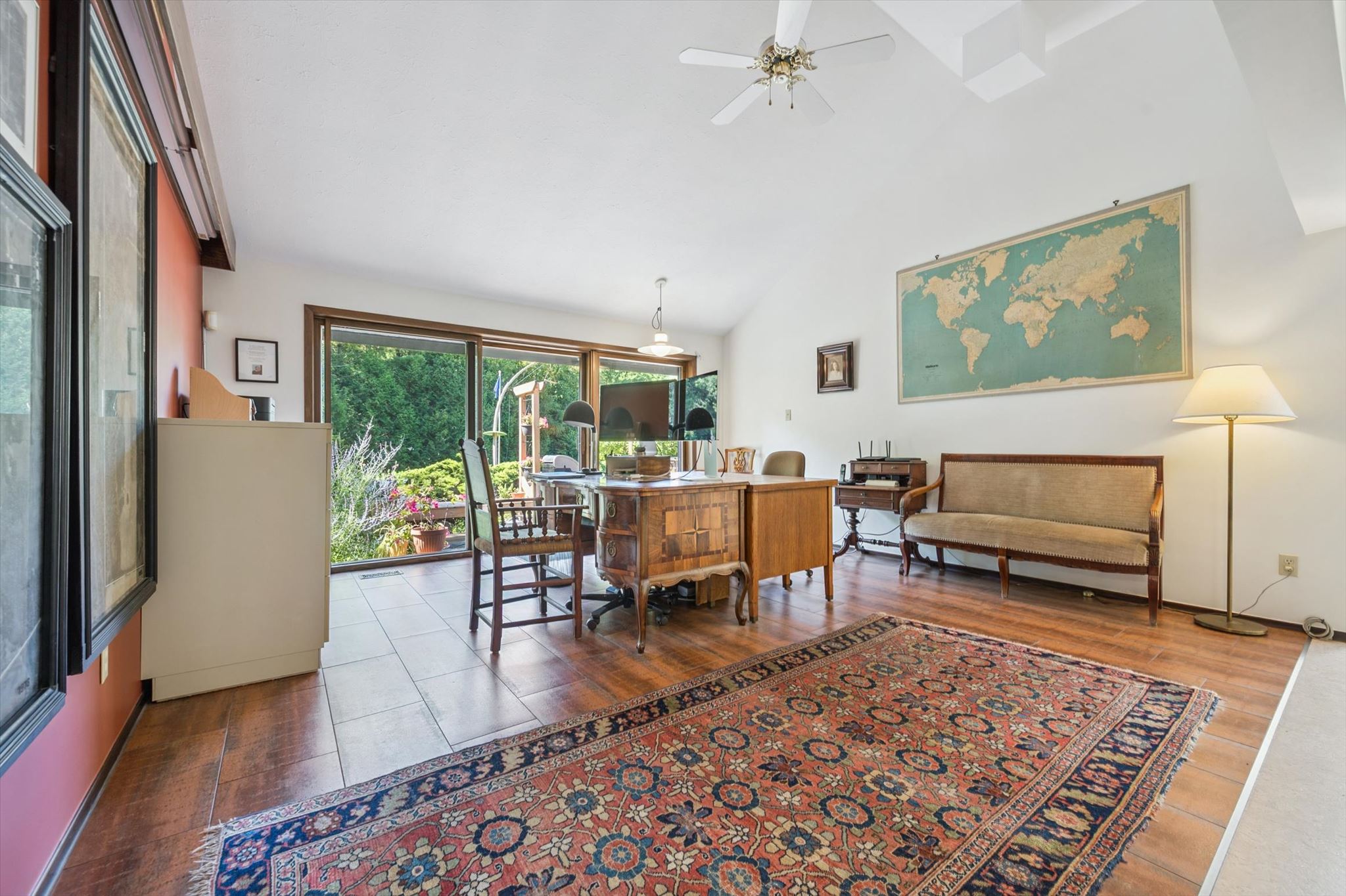Office opening to the garden through sliding doors