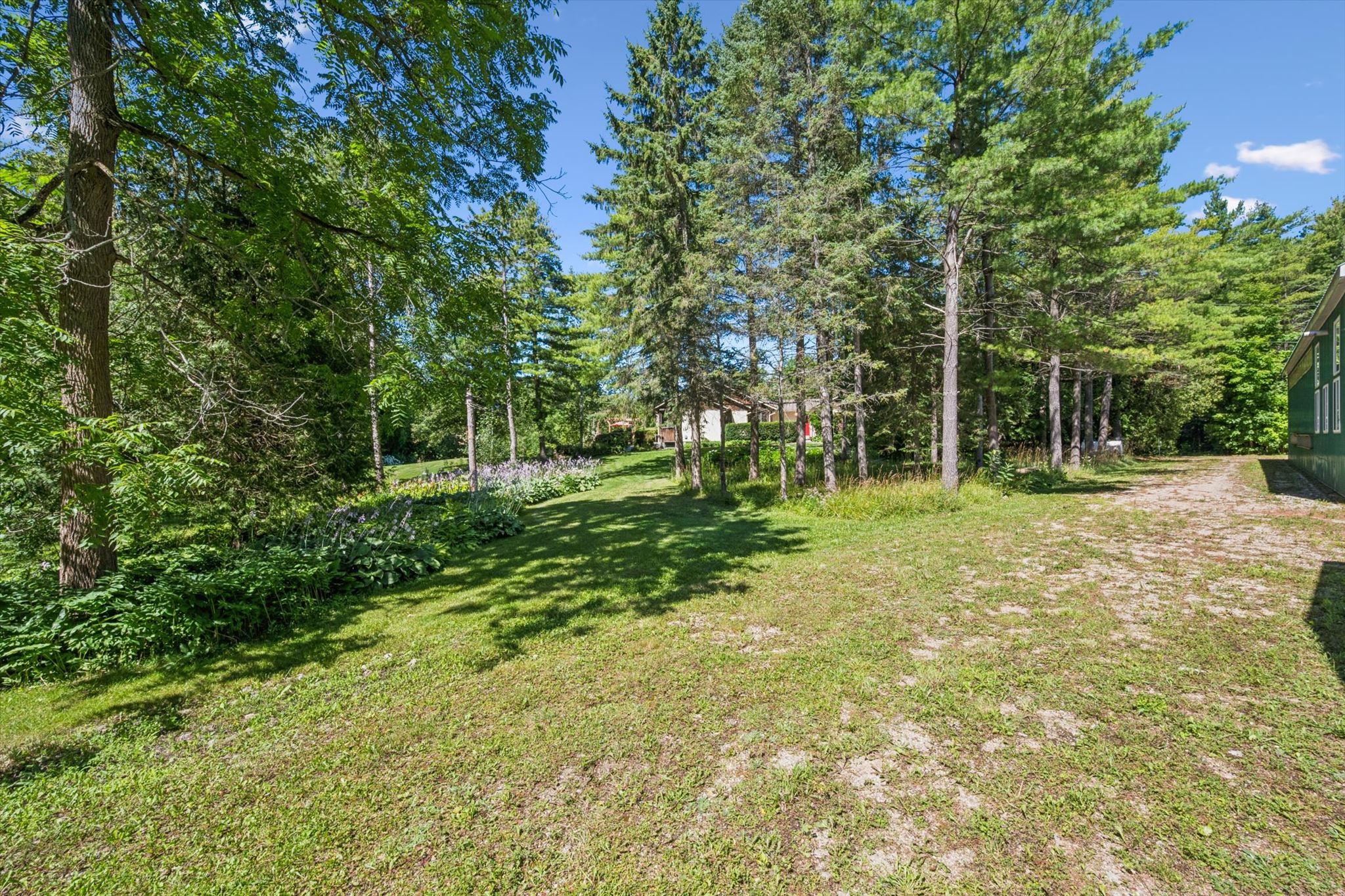 Lawn running out toward the outbuildings
