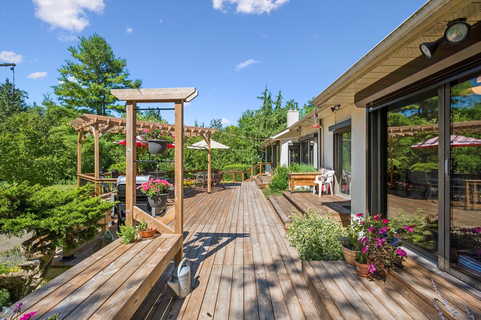 The deck runs the length of the house
