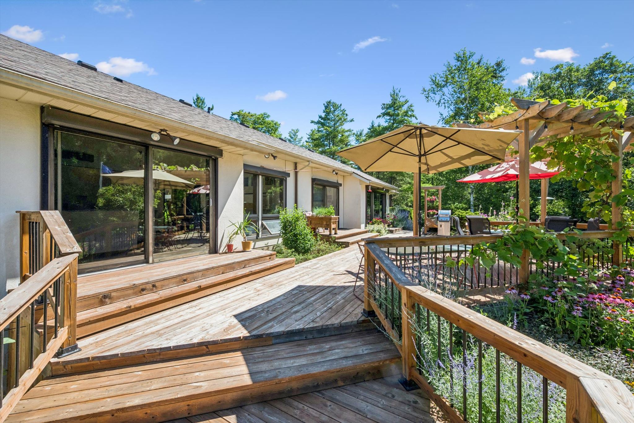 Sliding doors from the principal rooms to the deck